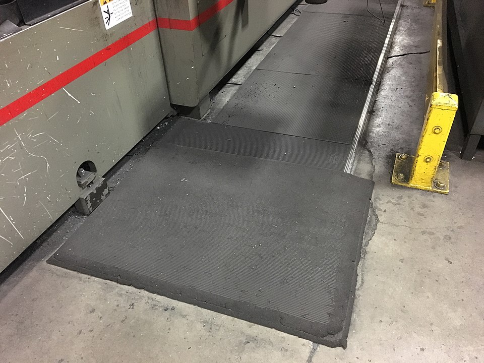 A pressure mat placed before a gate