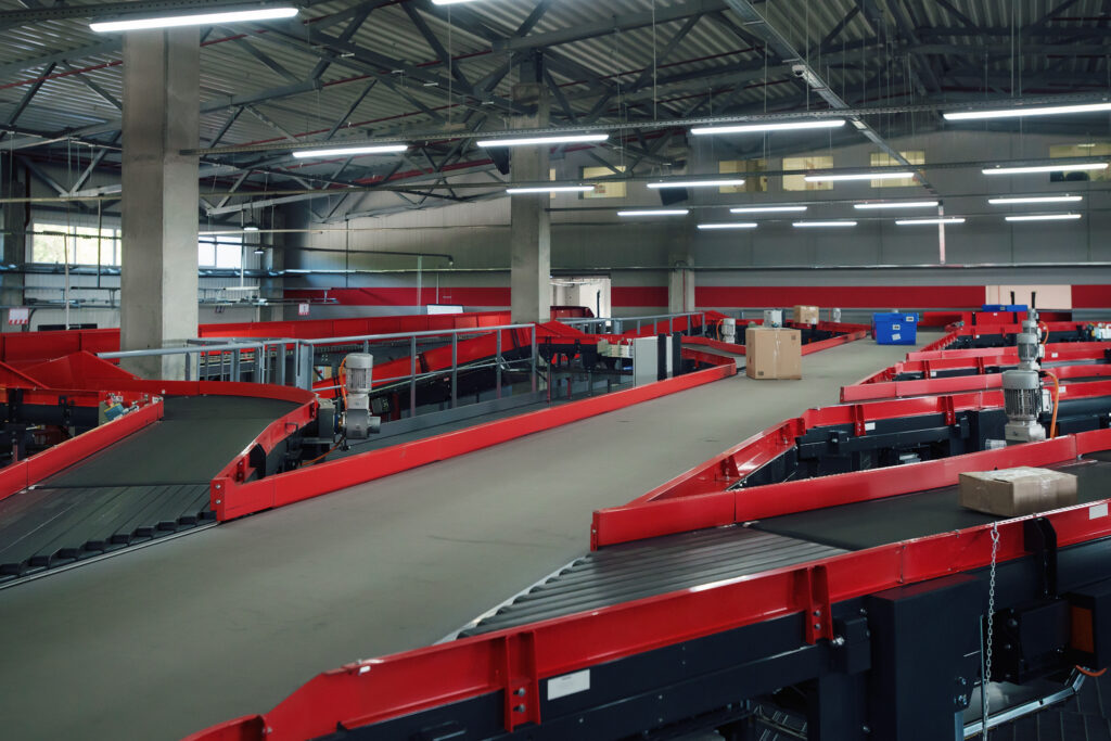 A conveyor belt system with partial guarding